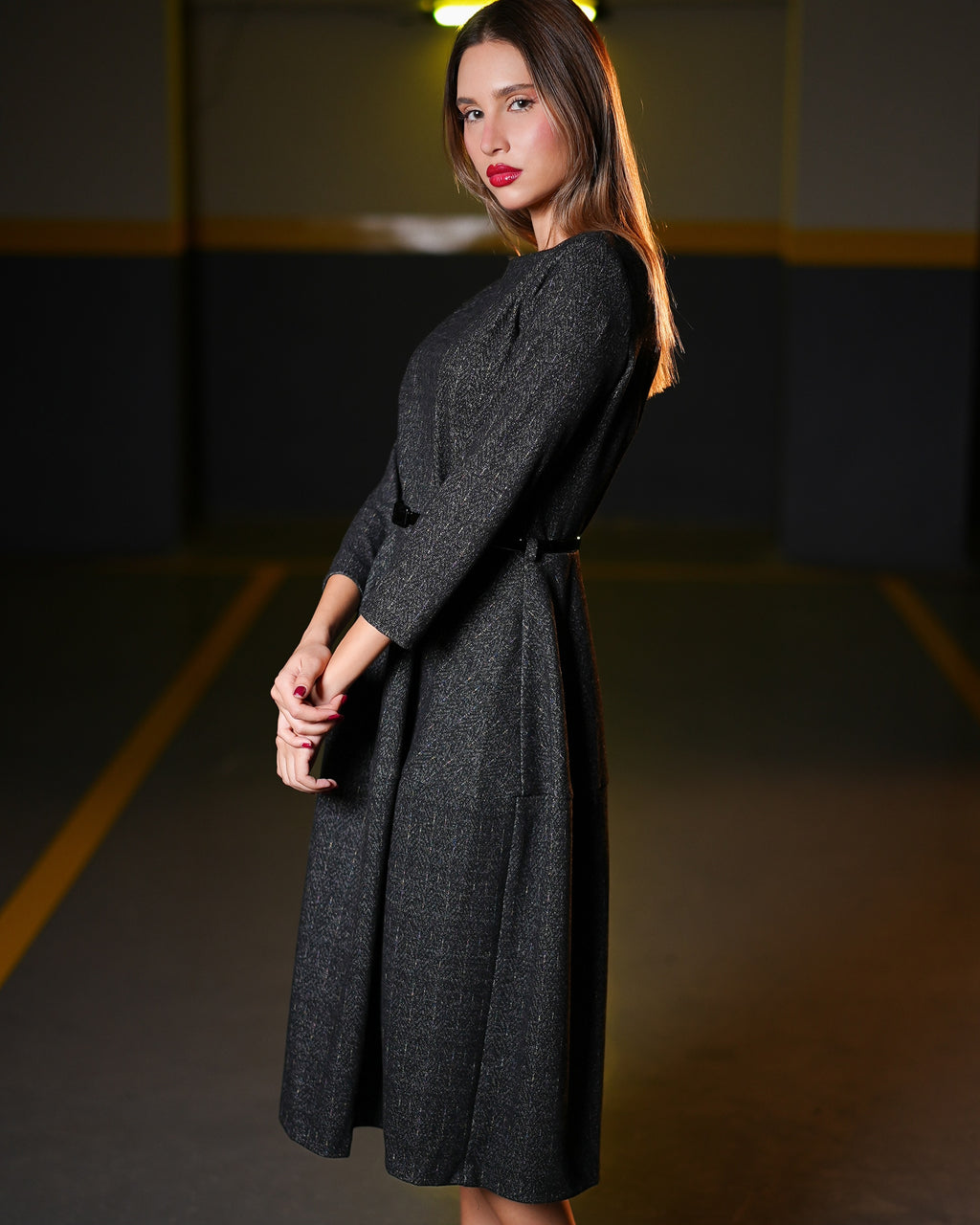 Dark gray elastic textured long-sleeve dress with a tie waist.